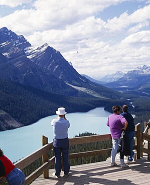 CANADA Alberta Peyto Lake Tourists on the elevated viewing platform over the lake looking towards the mountains