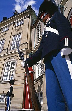 Royal guards with bayonet rifels standing outside the palace, Amalienborg Palace, Copenhagen, Denmark