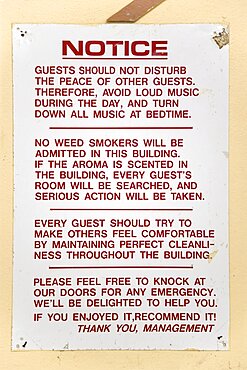 Hillsborough Notice from the management on the wall of a hotel asking that guests not disturb other guests with loud music or the smoking of cannabis weed, Caribbean