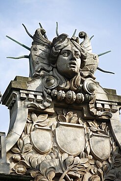 Poland, Krakow, Head of Apollo on top of the entrance to the Palace of Arts built in 1901 for the Society of Fine Arts Friends