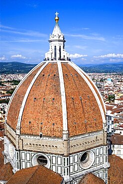 ITALY, Tuscany, Florence, The Dome of the Cathedral of Santa Maria del Fiore the Duomo by Brunelleschi with tourists on the viewing platform looking over the city towards the surrounding hills