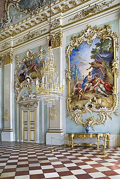 Germany, Bavaria, Munich, Nymphenburg Palace. Interior of Steinerner Saal the Stone or Great Hall with detail of paintings red and white chequered floor and gold and white baroque decoration by Francois de Cuvillies.