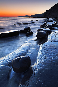 Rocky shore of Kimmeridge Bay at sunset, Jurassic Coast, UNESCO World Heritage Site, Dorset, England, United Kingdom, Europe