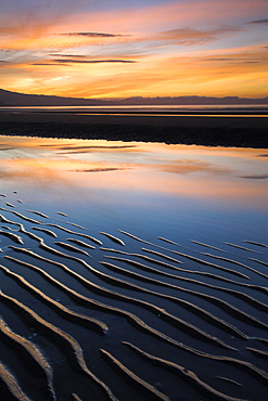 Sunset and sand ripples on Pohara Beach in Golden Bay, South Island, New Zealand, Pacific