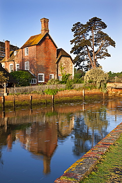 The 16th century Mill House beside Beaulieu River, New Forest, Hampshire, England, United Kingdom, Europe