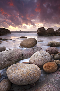 Sunset over the Atlantic from the shores of Porth Nanven, Cornwall, England, United Kingdom, Europe