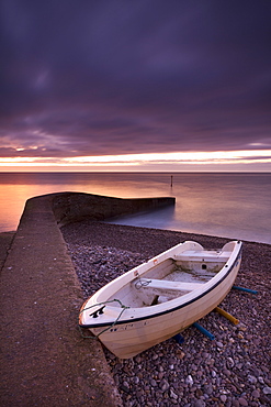 Fishing boat on Sidmouth beach at dawn, Sidmouth, Devon, England, United Kingdom, Europe