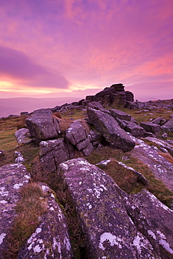 Intense fiery dawn sky above Belstone Tor, Dartmoor, Devon, England, United Kingdom, Europe