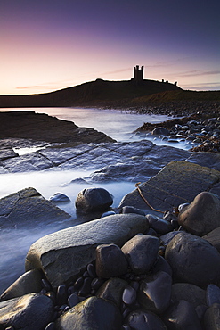 Rocky shores around Dunstanburgh Castle, Dunstanburgh, Northumberland, England, United Kingdom, Europe