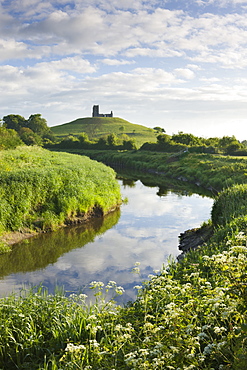 River Tone meandering towards Burrow Mump and the ruined church on its summit, Burrowbridge, Somerset, England, United Kingdom, Europe