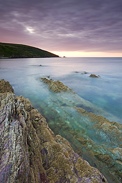 Pre-dawn glow over Talland Bay, South Cornwall, England, United Kingdom, Europe