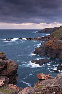 The Cornish coast at Trewellard Zawn looking towards Pendeen Lighthouse, Cornwall, England, United Kingdom, Europe