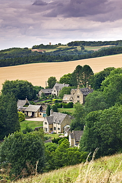 Overlooking the Cotswolds village of Snowshill, with Broadway Tower on the horizon, Worcestershire, England, United Kingdom, Europe 