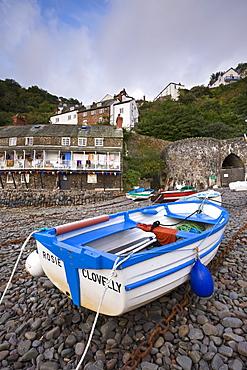 Fishing boat on the pebble beach in Clovelly harbour, Devon, England, United Kingdom, Europe