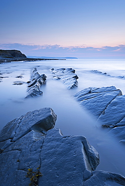 Twilight skies above rocky coast at Kilve Beach, Somerset, England, United Kingdom, Europe 