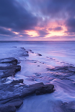 Dramatic sunset above Nash Point on the Glamorgan Heritage Coast, South Wales, Wales, United Kingdom, Europe