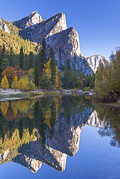 The Three Brothers reflected in the Merced River at dawn, Yosemite Valley, Yosemite National Park, UNESCO World Heritage Site, California, United States of America, North America