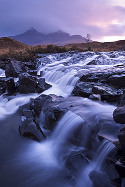 The river Allt Dearg Mor tumbling over a series of waterfalls in Glen Sligachan, Isle of Skye, Inner Hebrides, Scotland, United Kingdom, Europe