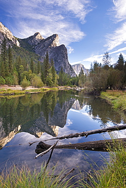 The Three Brothers mountains reflected in the tranquil waters of the River Merced, Yosemite National Park, UNESCO World Heritage Site, California, United States of America, North America