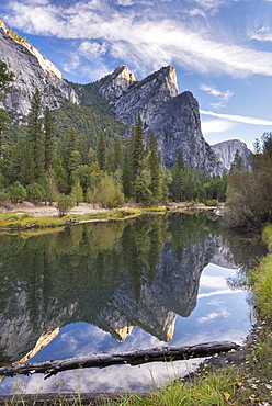 The Three Brothers reflected in the River Merced, Yosemite National Park, UNESCO World Heritage Site, California, United States of America, North America