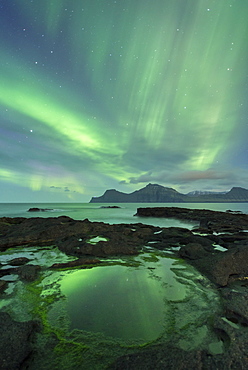 Aurora Borealis (Northern Lights) above the island of Kalsoy, Faroe Islands, Denmark, Europe