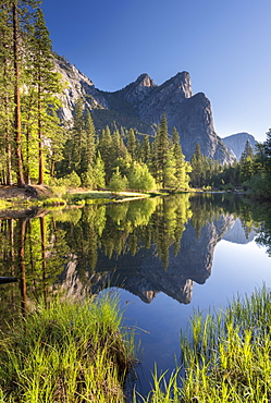 The Three Brothers reflected in the River Merced in Yosemite Valley, UNESCO World Heritage Site, California, United States of America, North America