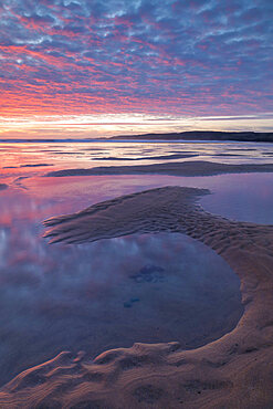 Beautiful sunset over the beach at Freshwater West in Pembrokeshire Coast National Park, Wales, United Kingdom, Europe