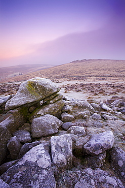 A foggy and frosty morning at the gates of megalithic Grimspound in winter, Dartmoor National Park, Devon, England, United Kingdom, Europe