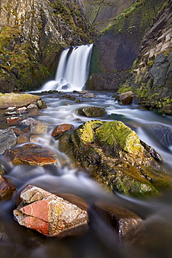 Rocks, stream and waterfall at Spekes Mill Mouth beach in North Devon, England, United Kingdom, Europe