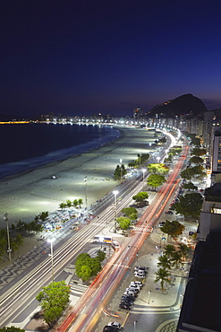 View of Copacabana beach and Avenida Atlantica at dusk, Copacabana, Rio de Janeiro, Brazil, South America 