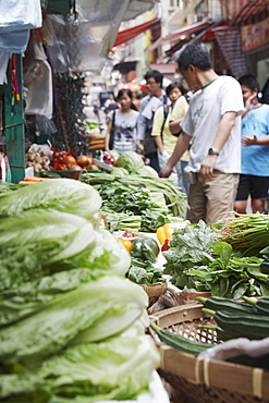 People buying vegetables at Graham Street market, Central, Hong Kong Island, Hong Kong, China, Asia