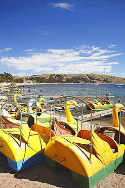 Pedaloes on beach, Copacabana, Lake Titicaca, Bolivia, South America