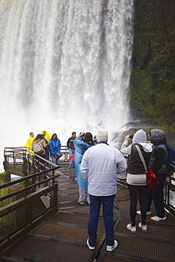 Tourists at Bossetti Falls, Iguazu Falls, Iguazu National Park, UNESCO World Heritage Site, Misiones, Argentina, South America