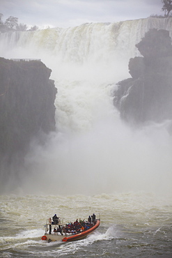 Tourist boat at Iguazu Falls, Iguazu National Park, UNESCO World Heritage Site, Misiones, Argentina, South America