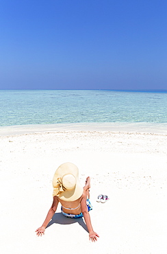 Woman on sandbank, Kaafu Atoll, Maldives, Indian Ocean, Asia