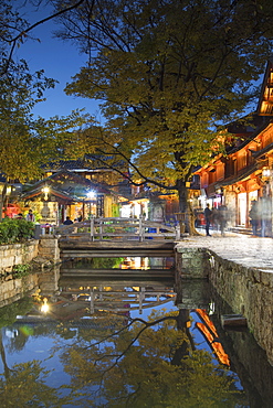 Canalside restaurant at dusk, Lijiang, UNESCO World Heritage Site, Yunnan, China, Asia