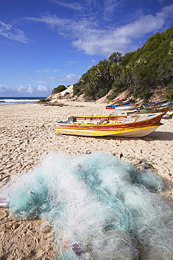 Fishing boats and nets on beach, Tofo, Inhambane, Mozambique, Africa