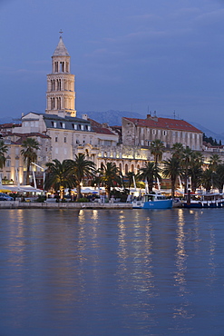 The Riva in the foreground and Cathedral of St. Dominus Tower in background at sunset, Split Harbor, Split, Dalmatia, Croatia, Europe