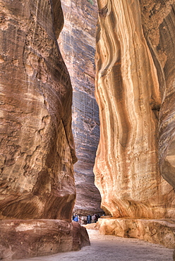 Tourists walking through the Siq, Petra, UNESCO World Heritage Site, Jordan, Middle East