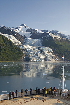 Passengers on cruise ship viewing the Vasser Glacier, College Fjord, Inside Passage, Alaska, United States of America, North America