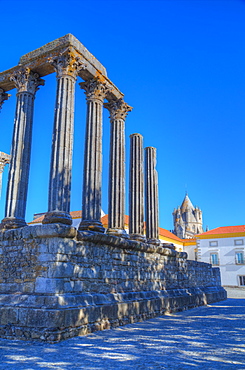 Roman Temple in foreground, Evora Cathdral in the background, Evora, UNESCO World Heritage Site, Portugal, Europe