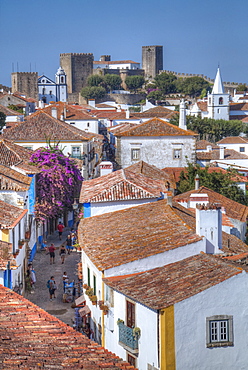 City overview with Medieval Castle in the background, Obidos, Portugal, Europe