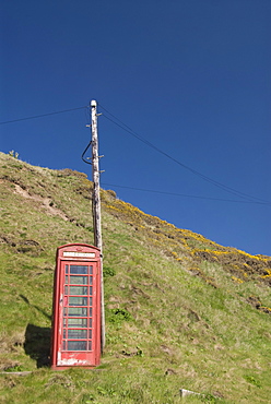 Isolated telephone box, Crovie, Highlands, Scotland, United Kingdom, Europe