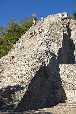 Tourists climbing Nohoch Mul (big mound), Coba, Quintana Roo, Mexico, North America