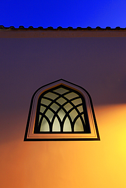 Dusk falls on a mosque window in the centre of the old city of Antayla, Anatolia, Turkey, Asia Minor, Eurasia