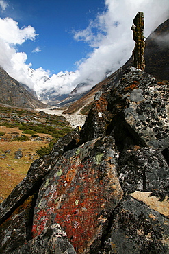 Lichen grows on an old Buddhist mani wall (prayer wall) constructed on the trail from Lukla to Tangnag, near Mera Peak, Khumbu region, Nepal, Himalayas, Asia