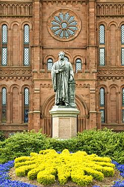 Entrance to the Smithsonian Castle with statue of Joseph Henry outside on the Mall in Washington, D.C., United States of America, North America