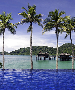 Beach and villas at the luxury resort and spa of Pangkor Laut, Malaysia, Southeast Asia, Asia