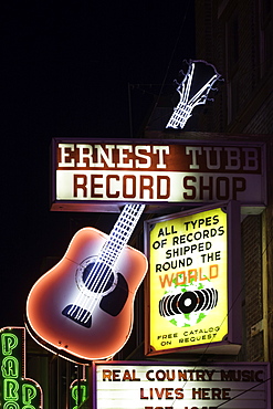 Neon signs and historic music clubs along Lower Broadway in Nashville, Tennessee, United States of America, North America