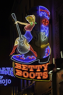 Neon signs and historic music clubs along Lower Broadway in Nashville, Tennessee, United States of America, North America